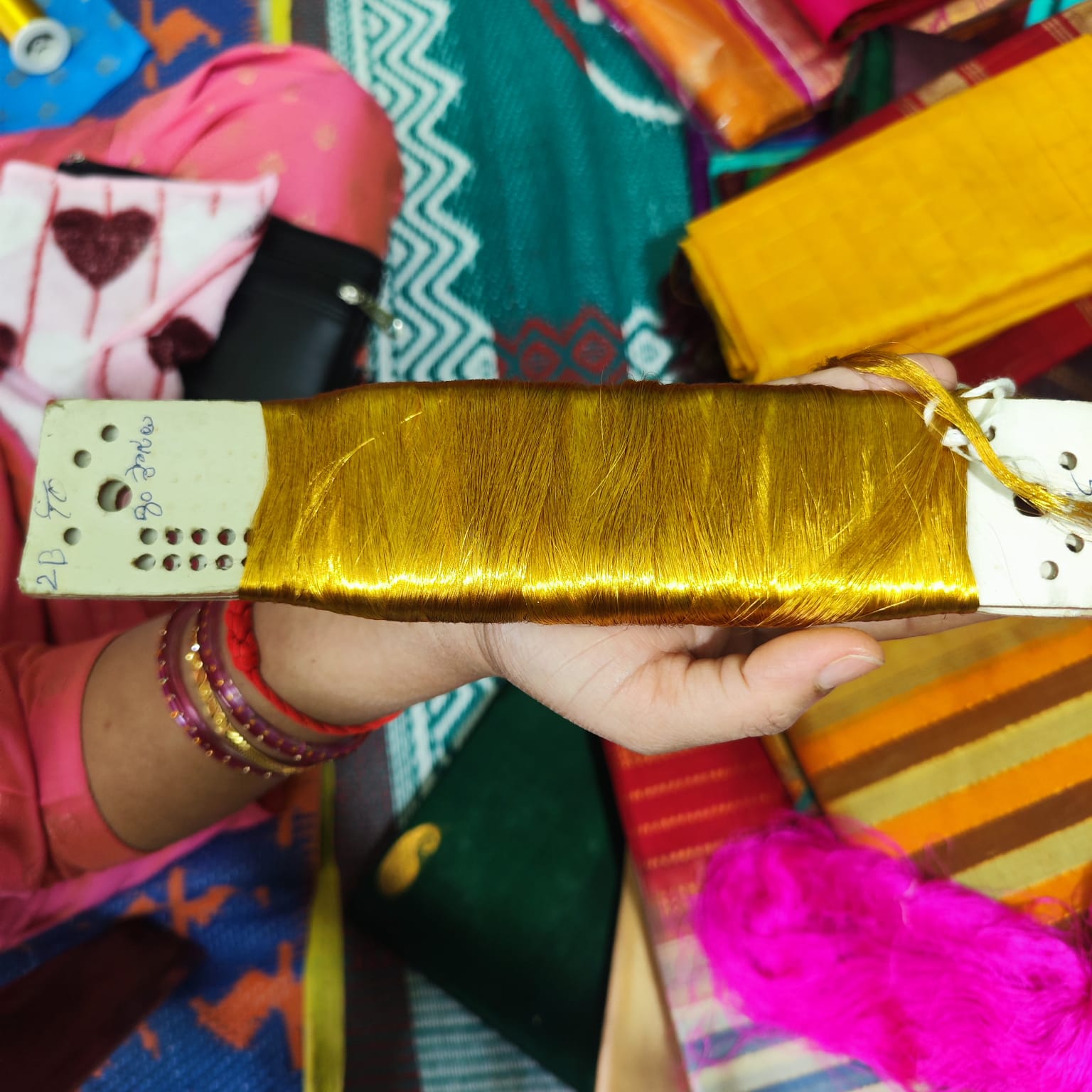 Shuttle used in the weaving process after bobbin winding